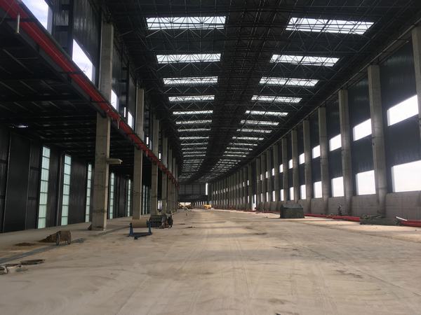 陕煤建设韩城分公司郭家湾集运站储煤棚工程1#、2#储煤棚主体结构工程顺利完工