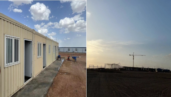 万顷黄沙映壮志，楼阁巍巍矗风沙