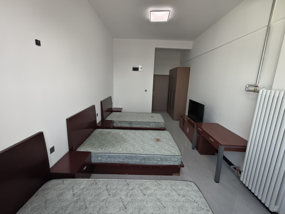陕煤建设铜煤公司承建的神南产业二期赋能楼宿舍装修项目顺利通过竣工验收